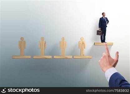 The career ladder concept with businessman. Career ladder concept with businessman