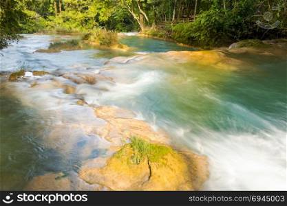 The cascade of blue water pools at Agua Azul waterfall near Palenque in Chiapas, Mexico
