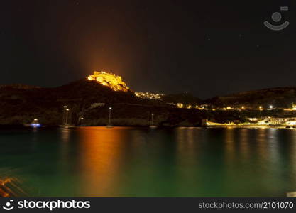 The castle of Kythira island at Greece at night as seen from Kapsali village. The castle Fortezza was built in the 13th century when Kythira was dominated by the Venetians. The castle of Kythira island at Greece at night as seen from Kapsali village.