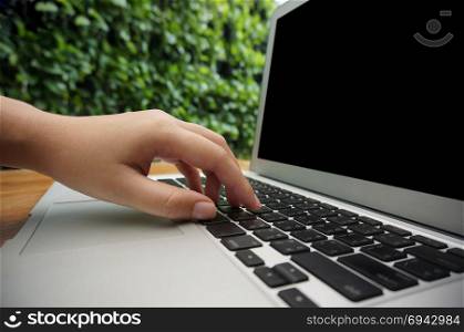 The Casual business woman works Hand typing on laptop keyboard