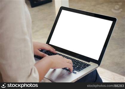 The Casual business woman works online on laptop which hand on keyboard in her house Isolated screen in laptop
