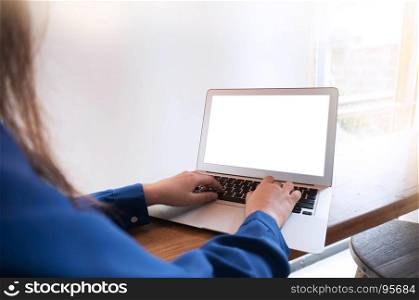 The Casual business woman works online on laptop which hand on keyboard in her house Isolated screen in laptop (blank white screen)