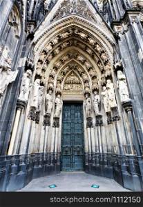 The cathedral of Cologne. Sandstone figures of saints from above the entrance