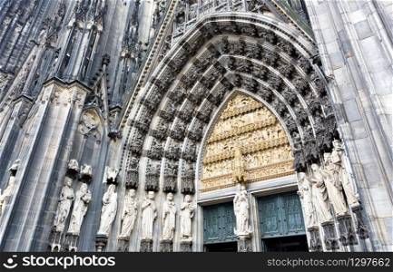 The cathedral of Cologne. Sandstone figures of saints from above the entrance