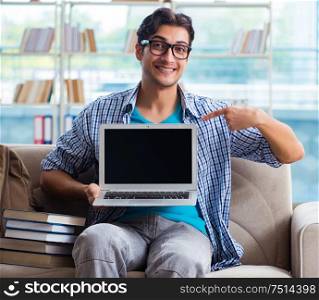 The caucasian student with laptop preparing for university exams. Caucasian student with laptop preparing for university exams