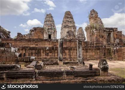 The central towers of the East Mebon temple near Angkor Wat in Cambodia rise over a central platform.&#xA;