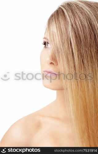 The charming blonde with the face covered by hair, isolated