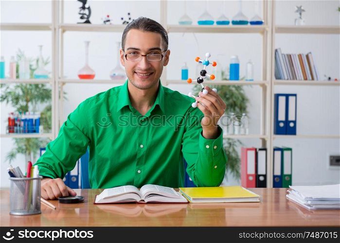 The chemistry student studying for exams. Chemistry student studying for exams