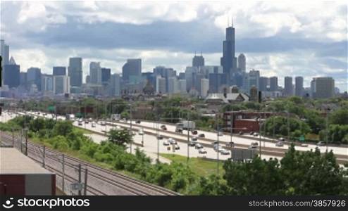 The Chicago skyline and the busy Kennedy Expressway traffic from a high angle