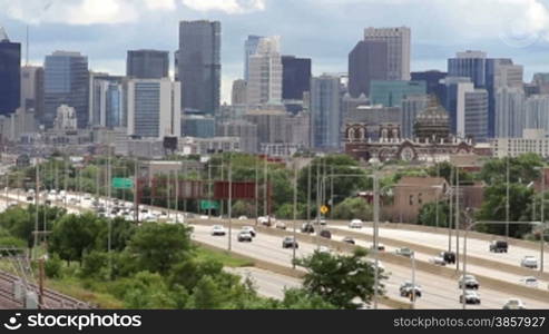 The Chicago skyline and the busy Kennedy Expressway traffic from a high angle