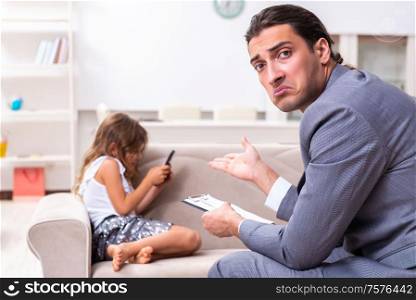 The child psychologist attending small girl. Child psychologist attending small girl