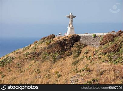 The Christ the King statue is a Catholic monument on Madeira island, Portugal