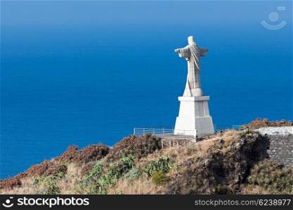 The Christ the King statue is a Catholic monument on Madeira island, Portugal