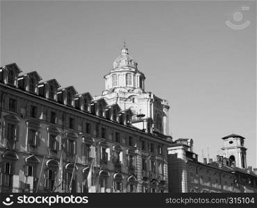 The church of San Lorenzo in Piazza Castello square in Turin, Italy in black and white. San Lorenzo church in Turin in black and white