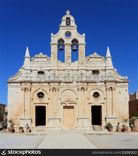 The church or Katholikon at the centre of Arkadi Monastery in Crete, Greece. The site is revered by Greeks as a symbol of their freedom struggle after the tragedy of 1866, when hundreds of Greeks fighting Ottoman occupation perished there.