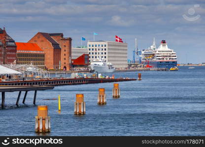 The city embankment on a sunny afternoon. Copenhagen. Sweden.. Copenhagen. The city embankment.