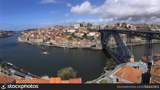 The city of Oporto (or Porto) in Portugal. Porto is one of the oldest European ports, and its historical centre was proclaimed a World Heritage Site by UNESCO in 1996. One of Portugal's internationally famous exports, port wine, is named after Porto, since the cellars of Vila Nova de Gaia, were responsible for the packaging, transport and export of the fortified wine.
