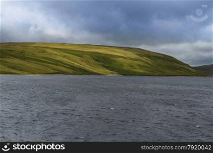 The Claerwen Reservoir, in the mid welsh hills surrounded by hills. Elan Valley, Powys, Wales, United Kingdom, Europe.
