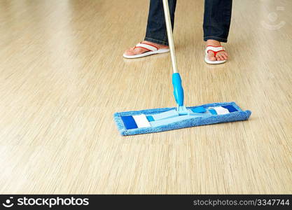 The cleaner washes a floor in premises