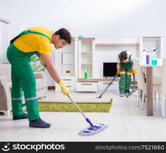 The cleaning professional contractors working at house. Cleaning professional contractors working at house