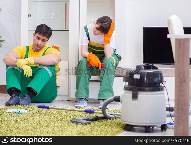 The cleaning professional contractors working at house. Cleaning professional contractors working at house