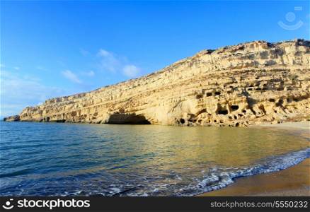 The cliffs at Matala beach, on the south coast of Crete, Greece, which were once Roman-era tombs but in the 1960s became home for a famous community of hippies and dropouts.