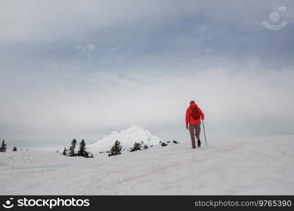 The climb in snowy mountains in the summer season