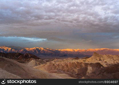 The cloud cover makes it dramatic at sunrise in Death Valley