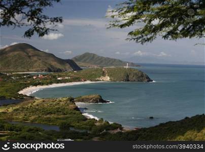 the Coast with the beach Playa Pedro Gonzalez in the town of Pedro Gonzalaz on the Isla Margarita in the caribbean sea of Venezuela.. SOUTH AMERICA VENEZUELA ISLA MARGATITA PEDRO GONZALEZ BEACH