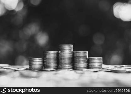 The coins were stacked five, and many coins were lying around.