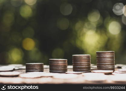 The coins were stacked four, and many coins were lying around.