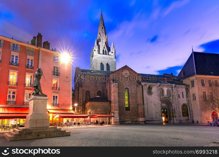 The Collegiate Church of Saint Andrew front, Saint Andrew square at night, Grenoble, France. Saint Andrew square in Grenoble, France