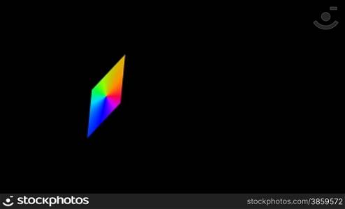The color rhomb flies and rotates against a dark background