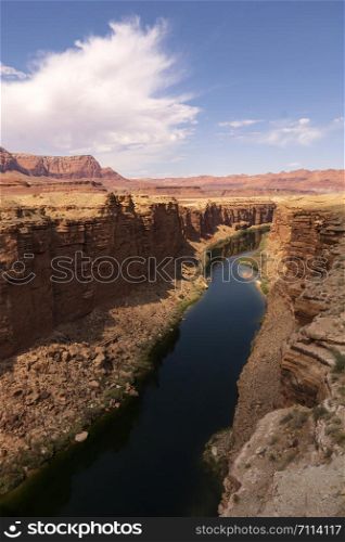 The Colorado River cuts thru Marble Canyon below the ridges and buttes of Northern Arizona