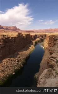 The Colorado River cuts thru Marble Canyon below the ridges and buttes of Northern Arizona