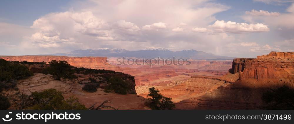 The Colorado River has cut out a massive canyon below and island in the sky