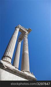 The columns of an ancient roman temple, Teatro Marcello, Rome, Italy.