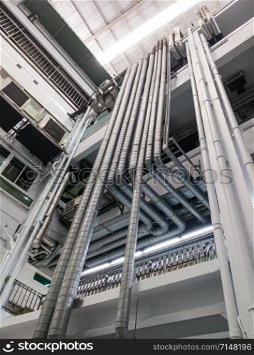 The complex metal pipe of the ventilation system in the large hospital.