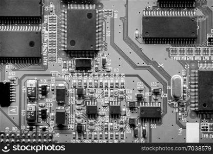 The computer electronic card with chips, microprocessors, transistors, explorers and other electronic parts.