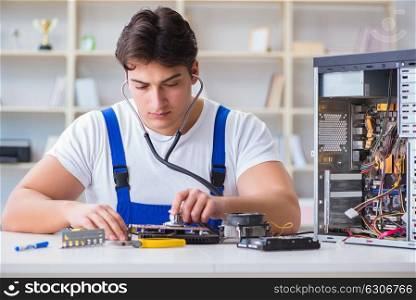 The computer repairman repairing desktop computer. Computer repairman repairing desktop computer