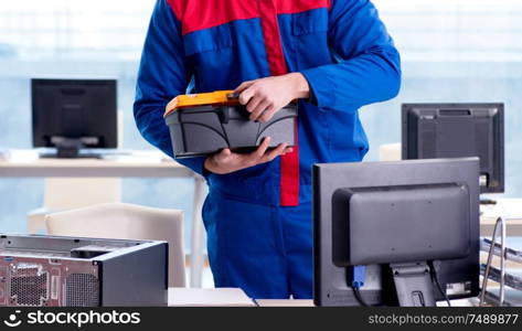 The computer repairman specialist repairing computer desktop. Computer repairman specialist repairing computer desktop