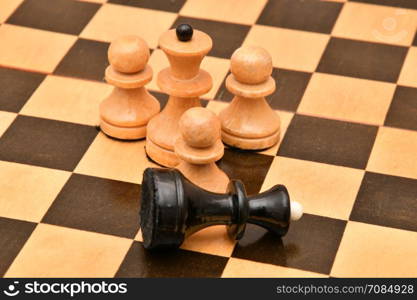 The concept of business take the right decision. Chess piece on a chessboard