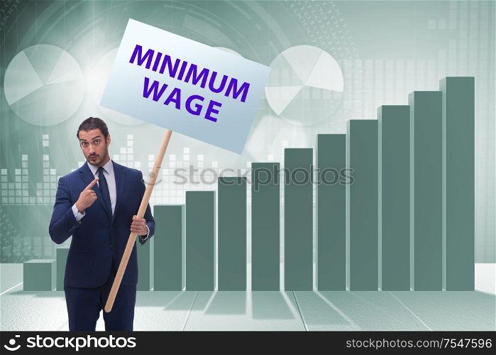 The concept of minimum wage with businessman. Concept of minimum wage with businessman