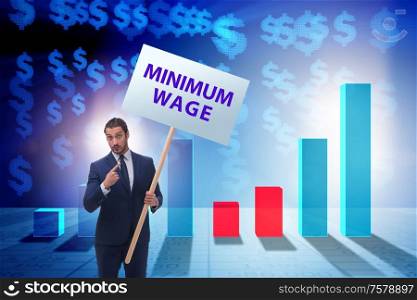 The concept of minimum wage with businessman. Concept of minimum wage with businessman