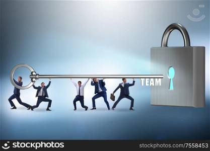 The concept of teamwork with businessmen unlocking lock. Concept of teamwork with businessmen unlocking lock