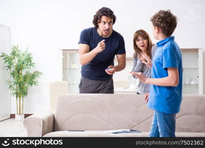 The concept of underage smoking with young boy and family. Concept of underage smoking with young boy and family