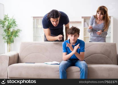 The concept of underage smoking with young boy and family. Concept of underage smoking with young boy and family