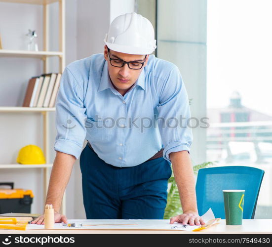 The construction engineer working on new project. Construction engineer working on new project