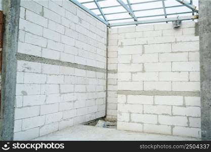 The contractor is installing the wall,Interior pictures of buildings being constructed with autoclaved aerated bricks.