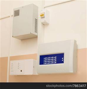 The control units fire alarm mounted on the wall